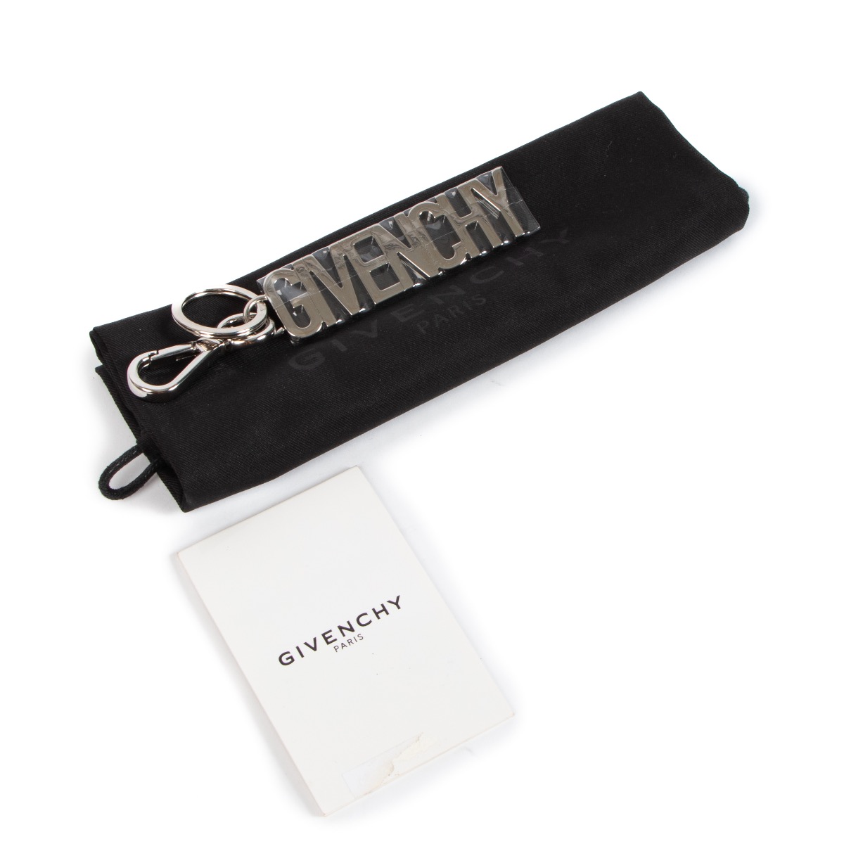 Givenchy Silver Logo Key Charm ○ Labellov ○ Buy and Sell