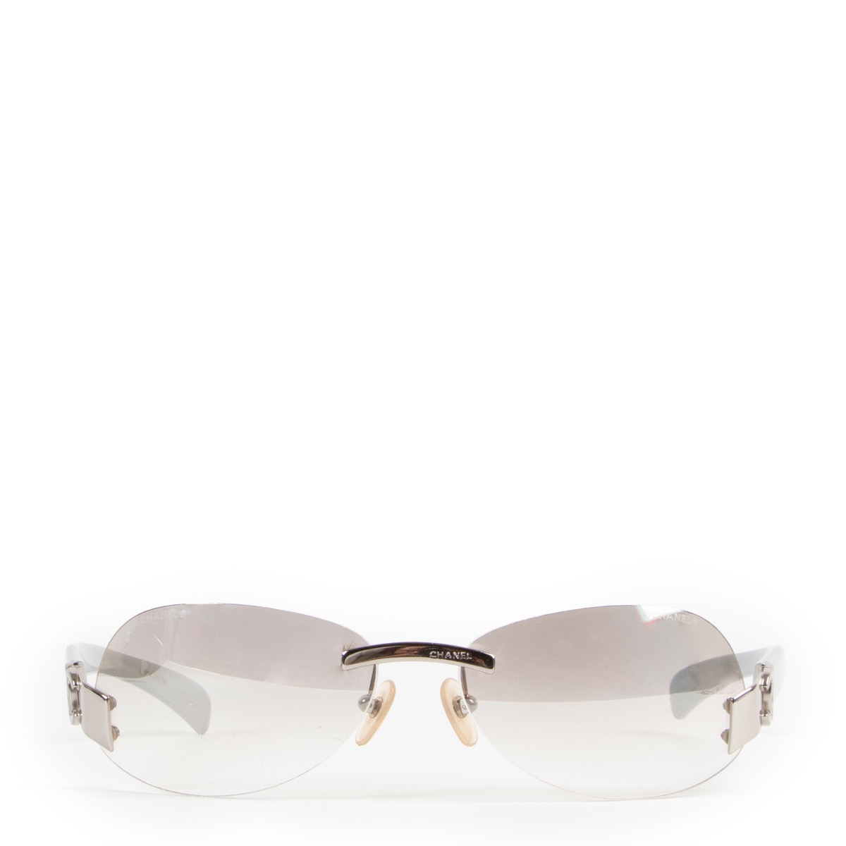 Chanel Silver CC Rimless Sunglasses Labellov Buy and Sell