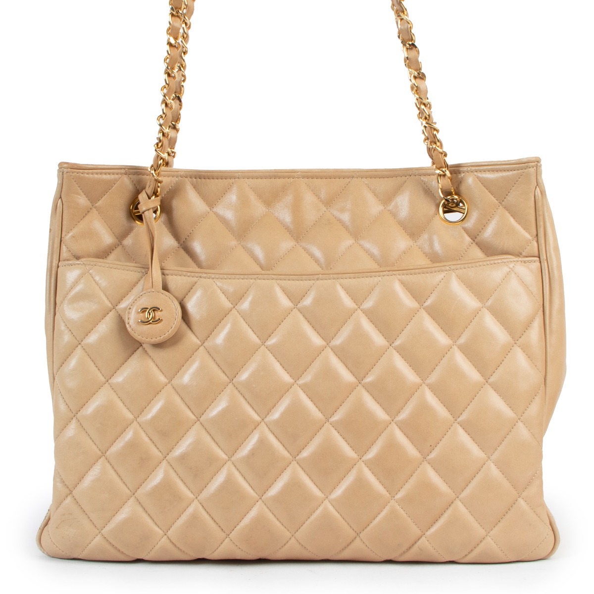 Chanel Beige Quilted Lambskin CC Charm Tote Bag Labellov Buy and Sell  Authentic Luxury