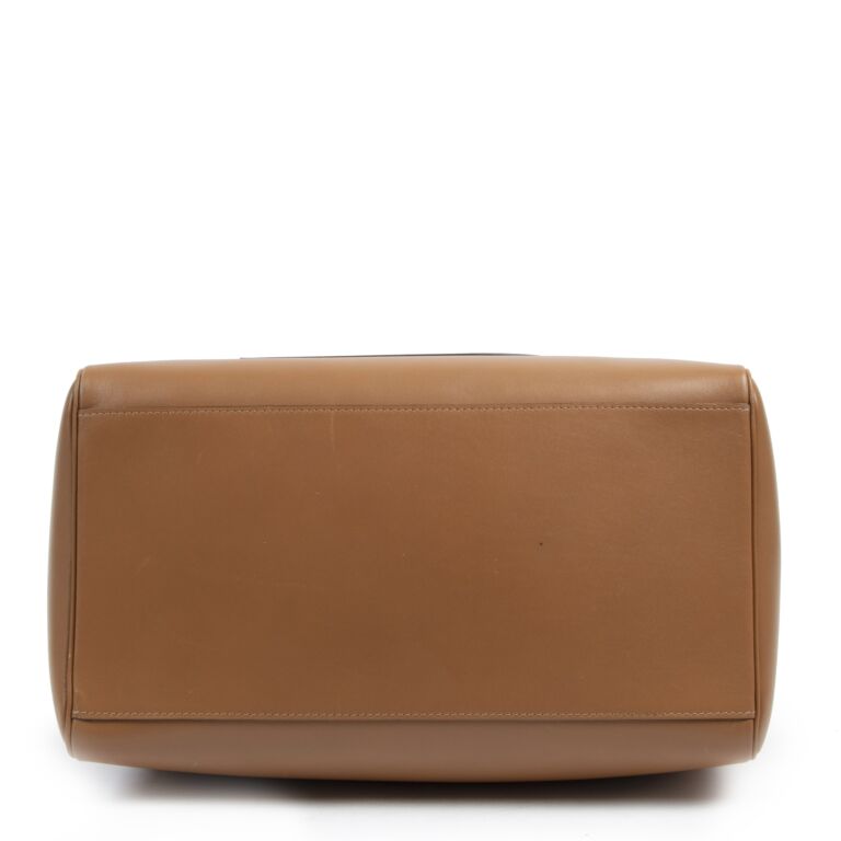 Sold at Auction: Delvaux Tempête MM cognac color calf leather handbag