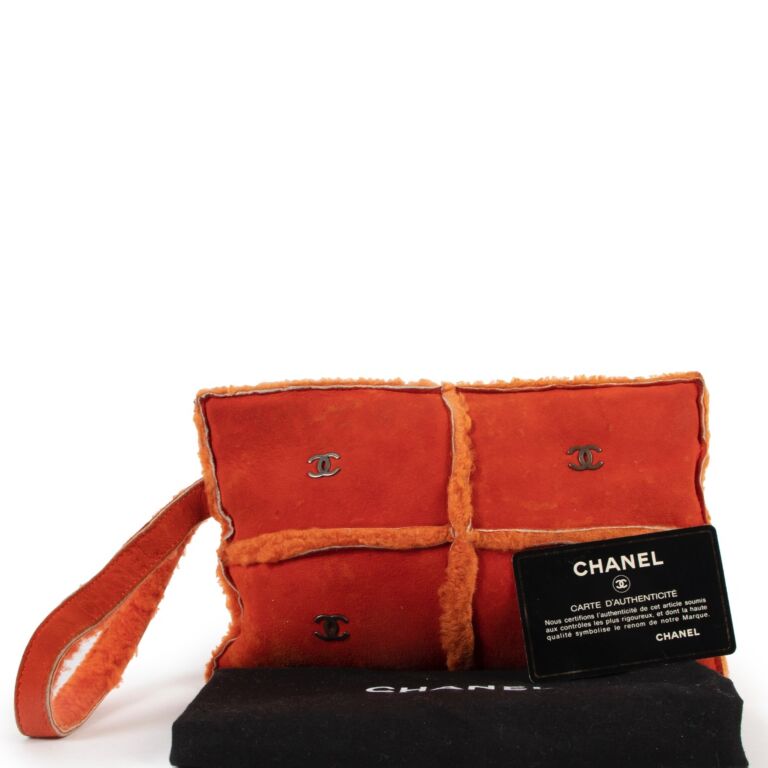 Chanel Orange Shearling Clutch Labellov Buy and Sell Authentic Luxury