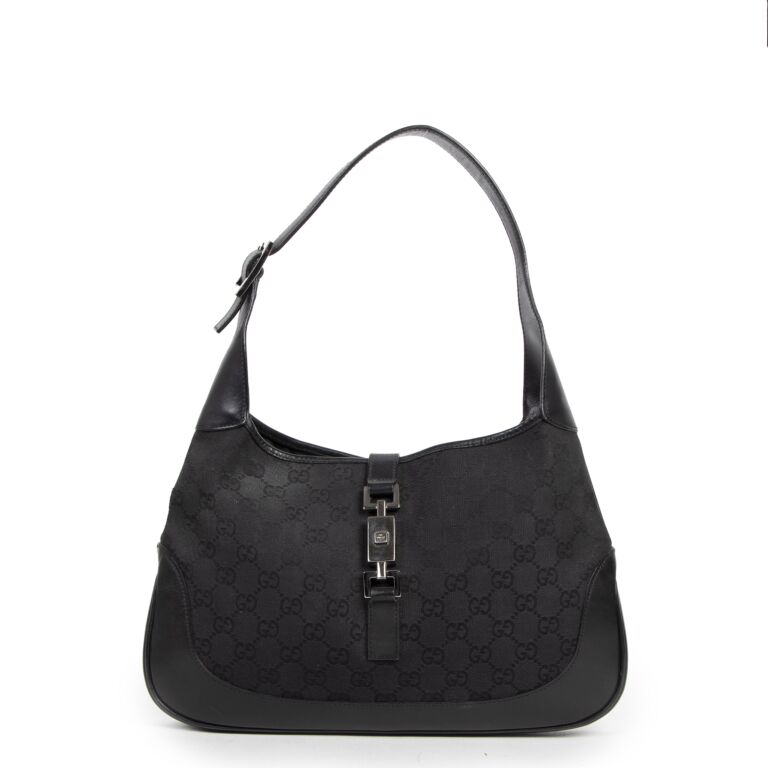 Black monogram store bag
