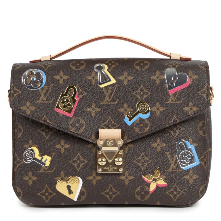 Louis Vuitton Pochette Metis Limited Edition Love Lock Monogram Canvas at  1stDibs