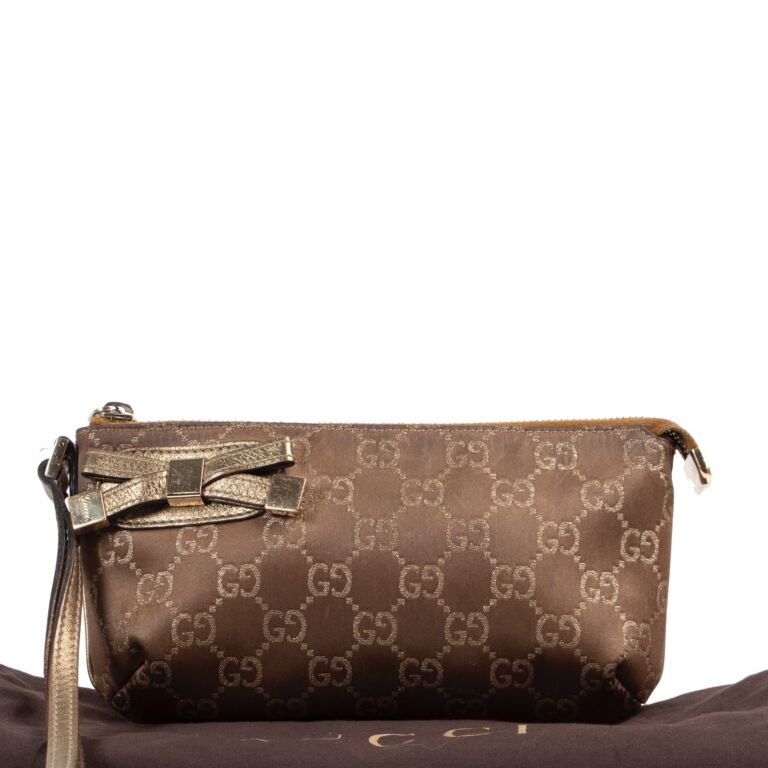 Gucci Gold Monogram Pouch Labellov Buy and Sell Authentic Luxury