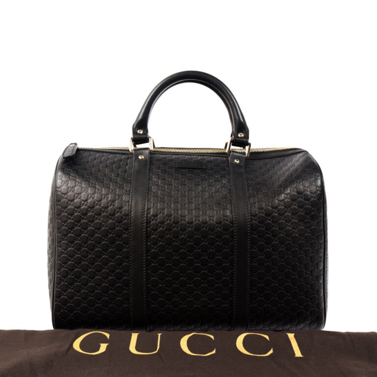 Guccissima black leather handbag deals