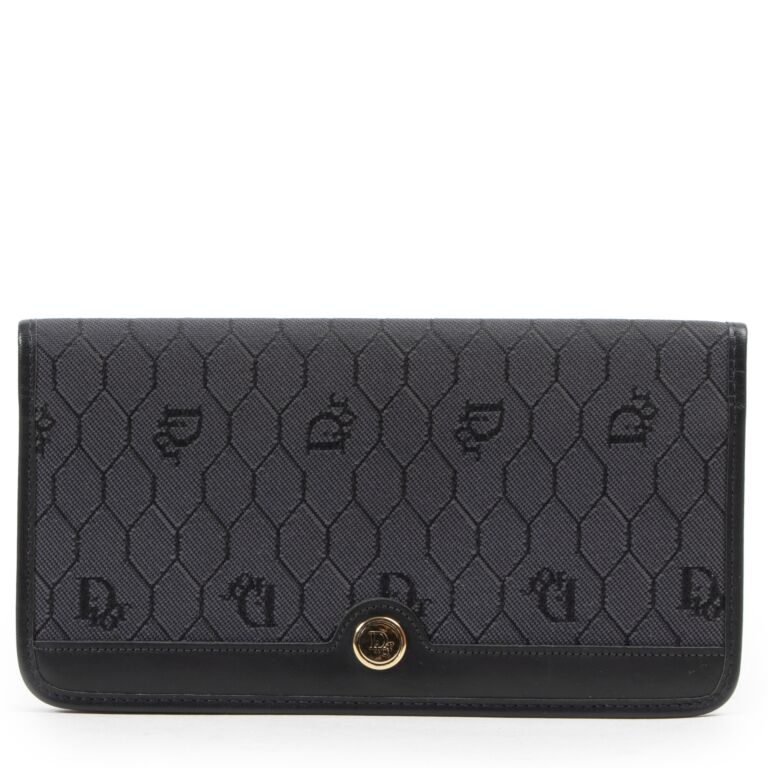 Christian Dior Black Passport Holder Labellov Buy and Sell Authentic Luxury