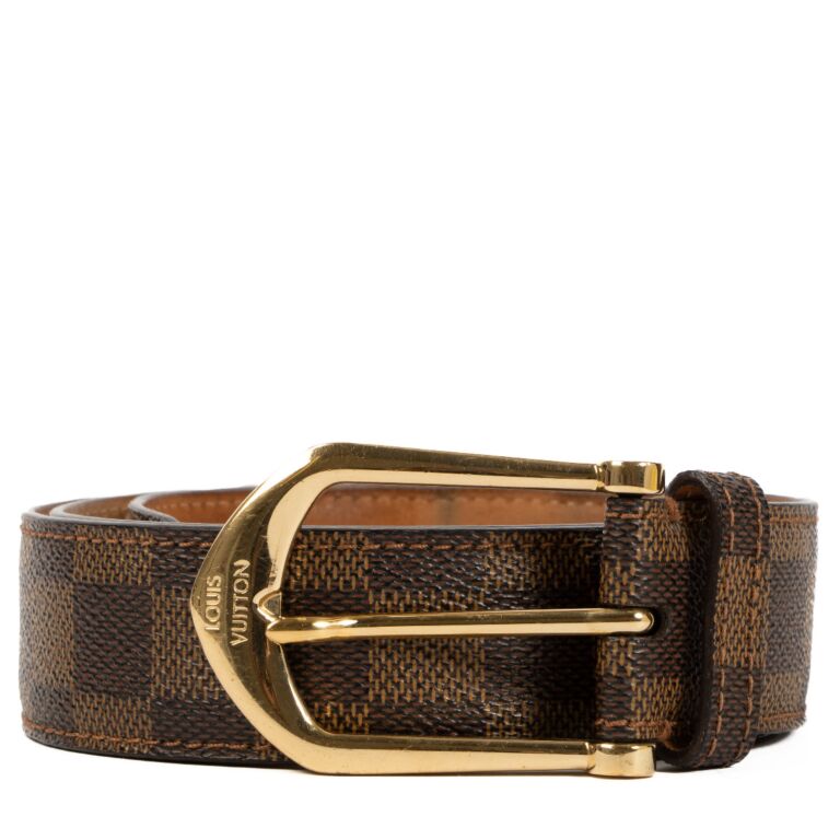 Damier belt outlet