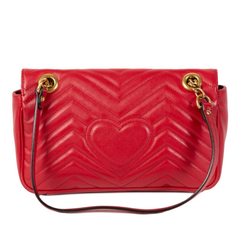 Gucci bag with 2025 heart on the back