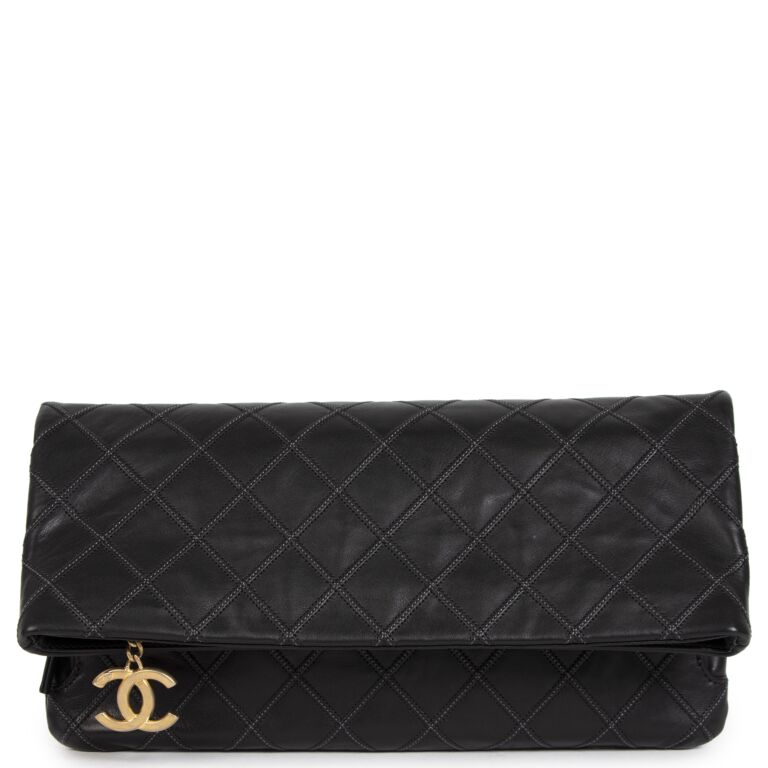 Chanel quilted clutch bag discount