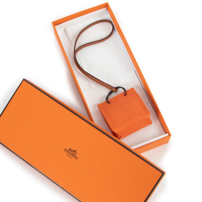 Hermes orange charm discount