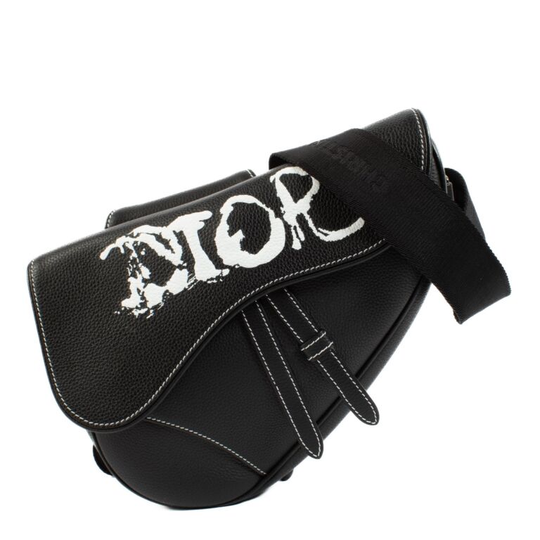 Saddle bag flatish in black calfskin price