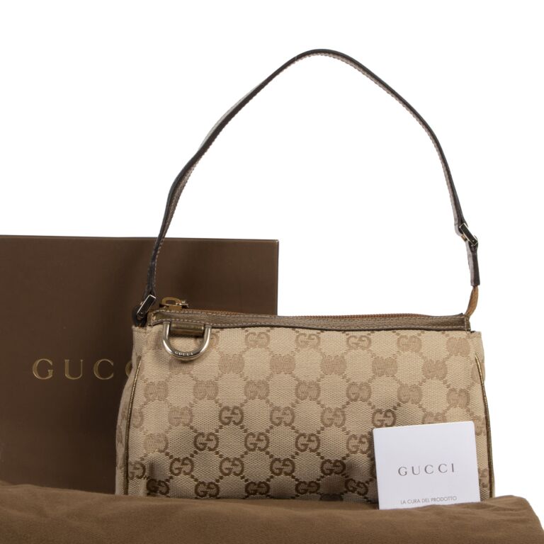 Gucci Gold Canvas Monogram Pochette Labellov Buy and Sell Authentic Luxury