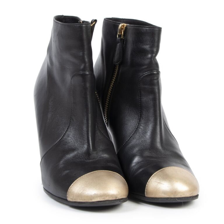 Gold top chanel boots