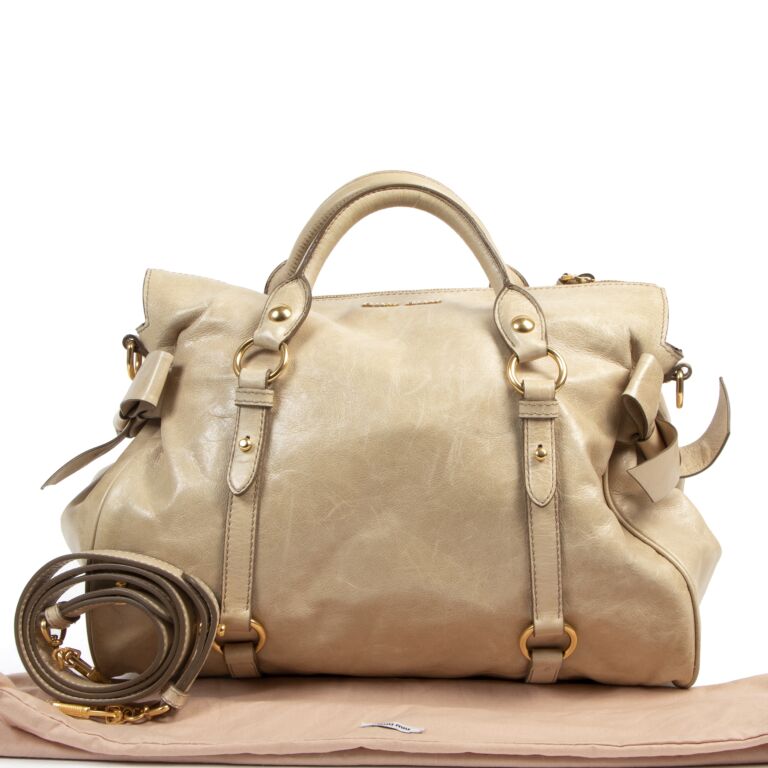 Miu Miu Vitello Lux Bow Bag Labellov Buy and Sell Authentic