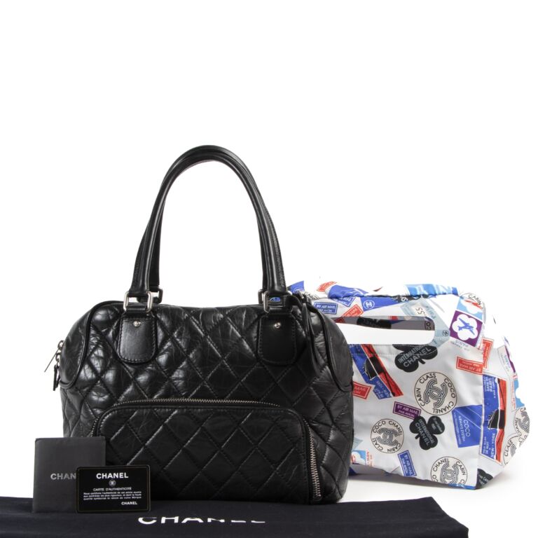 Chanel Black Quilted Leather New York Tote Labellov Buy and Sell Authentic Luxury