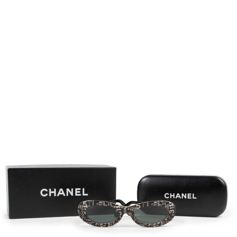 Chanel logo deals sunglasses