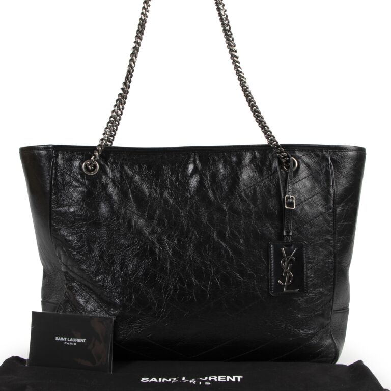 Ysl niki quilted leather zip best sale pouch