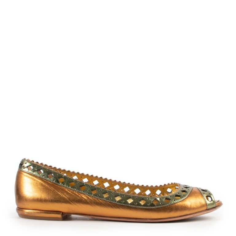 prada gold flats