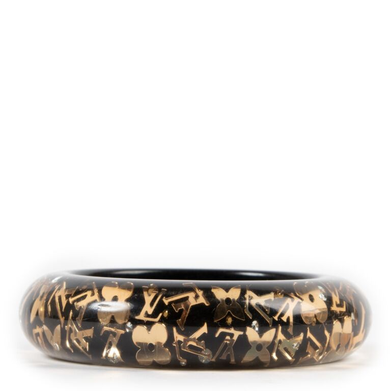 Louis Vuitton, Inclusion bracelet Black Golden Plastic Resin ref