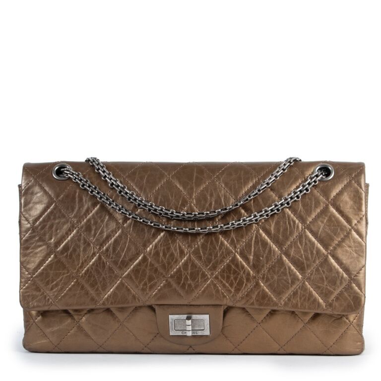 Chanel on sale 2.55 gold