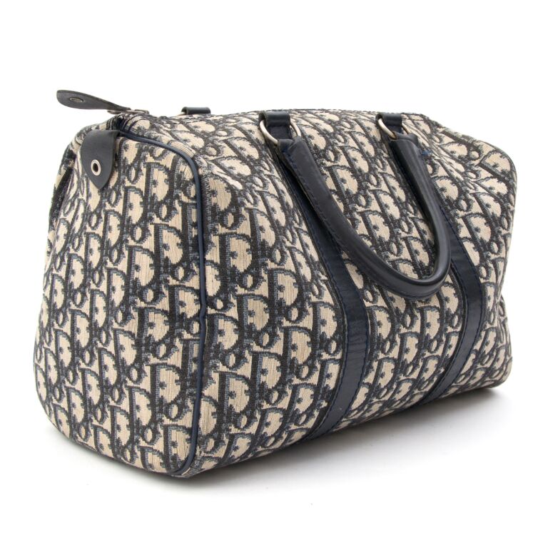 Dior duffle bag price hot sale