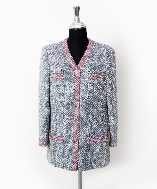 A Chanel Pink and White Tweed Jacket, Size 34. sold at auction on 7th April