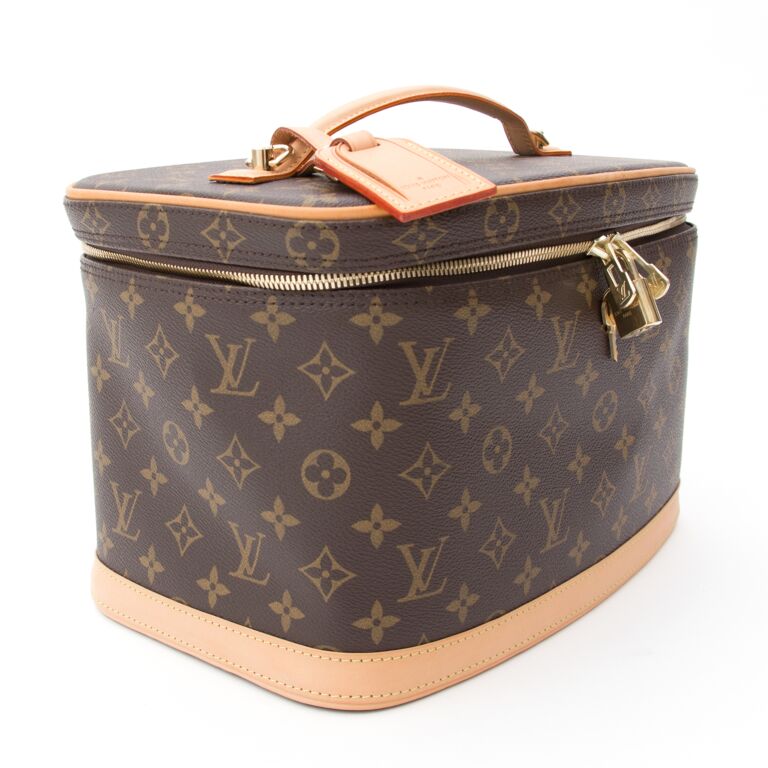 Louis VUITTON. Travel cover for clothes in monogrammed c…