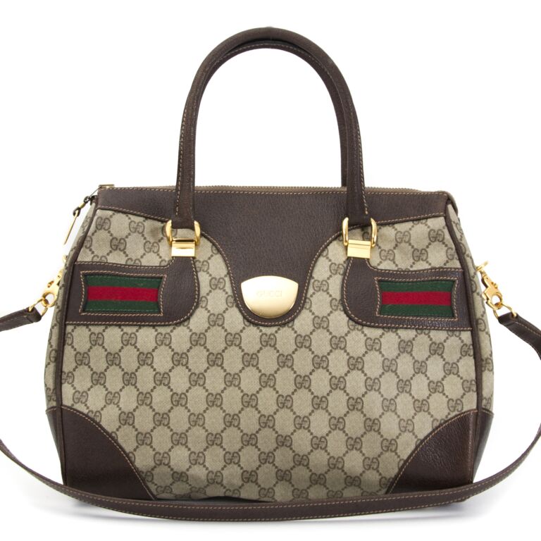 Heritage Vintage: Gucci Classic Monogram Canvas Pochette Bag. , Lot  #75015