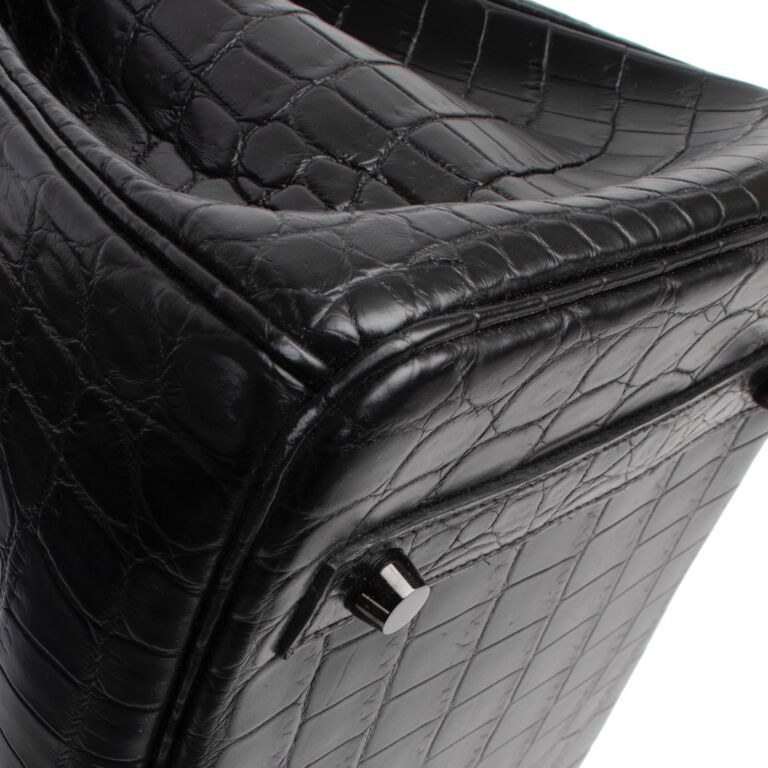 HERMÈS, a black crocodile Kelly 35 bag from the 1960s. - Bukowskis