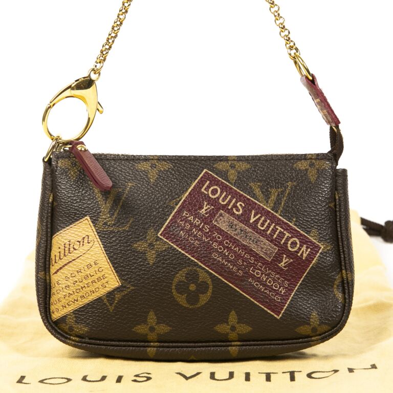 Louis Vuitton Monogram Stamp Canvas Mini Pochette Bag. Excellent