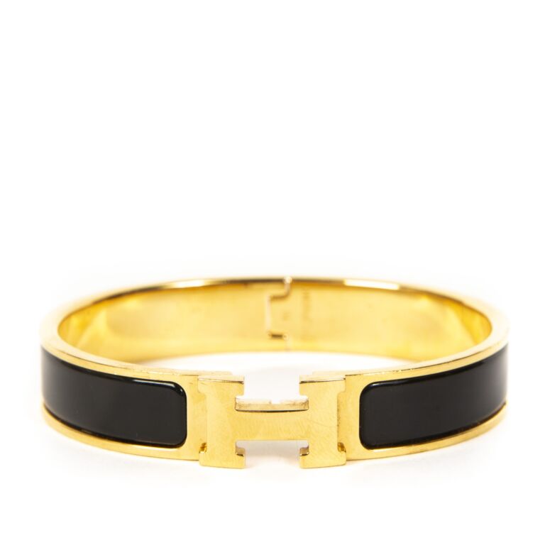Hermes black outlet gold bracelet
