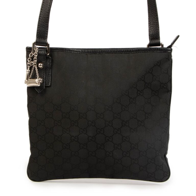 Gucci Black GG Messenger Bag Labellov Buy and Sell Authentic