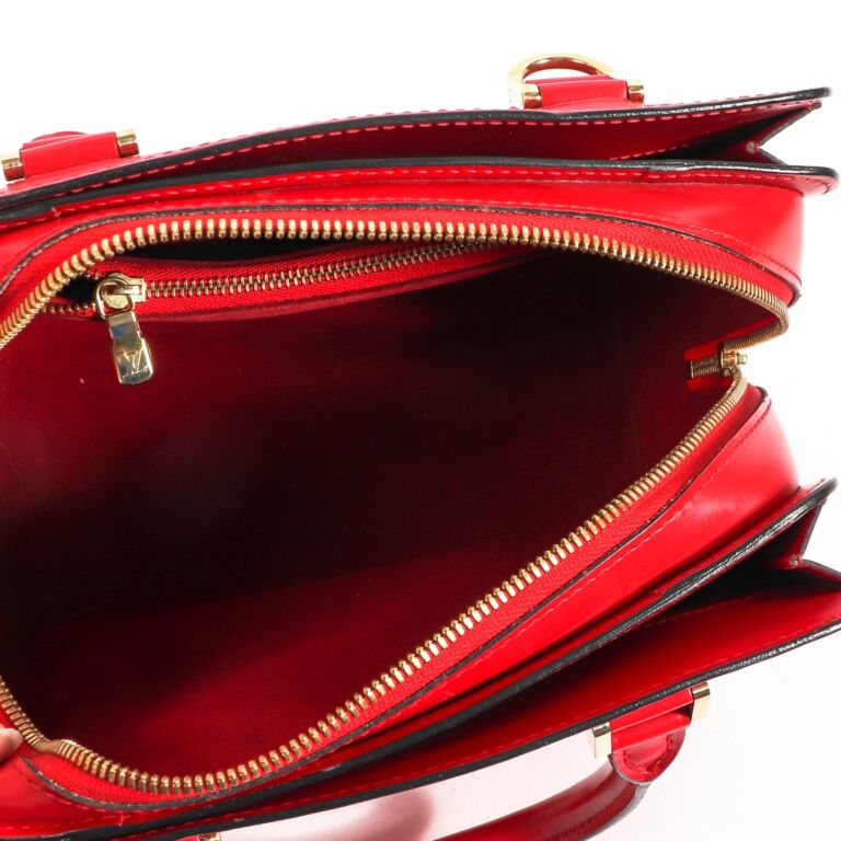 Do real louis vuitton have red on handles on sale
