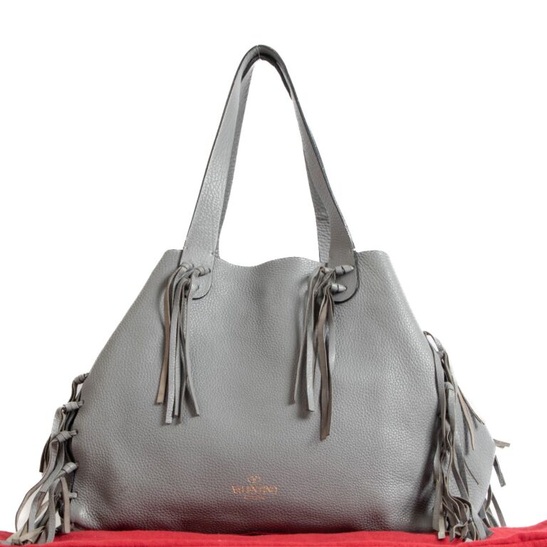 Tassel valentino clutch discount bag