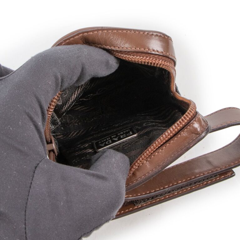 Prada Brown Leather Wrist Mini Pouch Labellov Buy and Sell