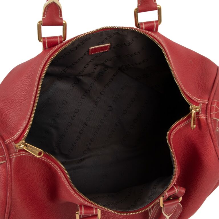 Sold at Auction: Louis Vuitton, Louis Vuitton red leather travel bag  'Suhali