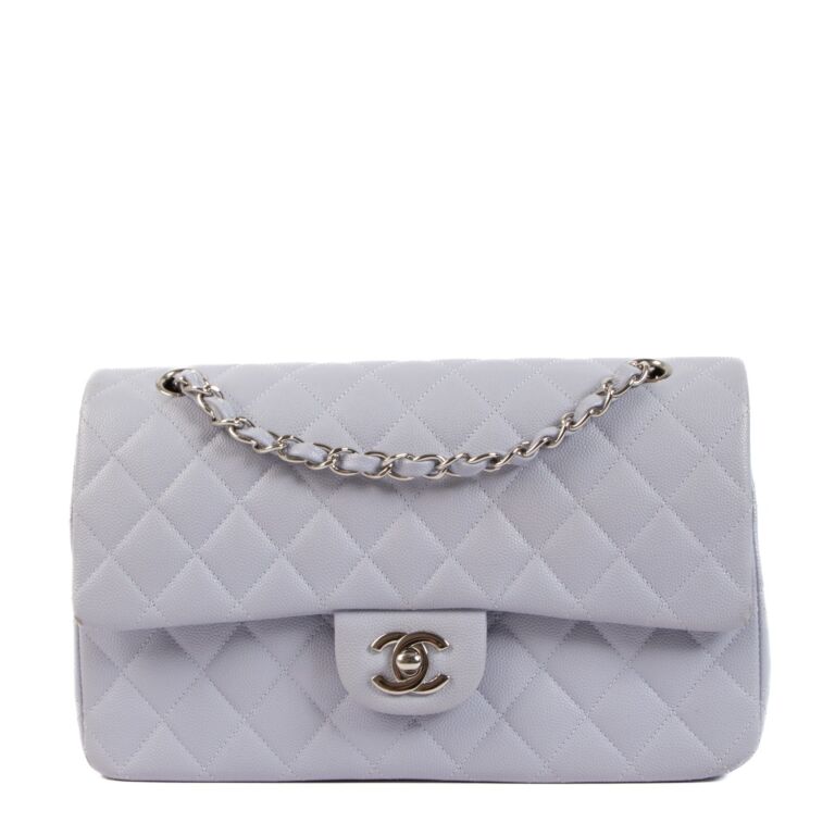 A WHITE CAVIAR LEATHER MEDIUM DOUBLE FLAP BAG WITH SILVER HARDWARE CHANEL  20052006  Christies