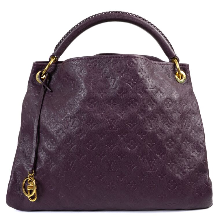 Sold at Auction: A Louis Vuitton Montana Handbag. Patent deep purple  monogram leather exterior. Gold-tone hardware. Textile interior with open  compartment. In excellent condition with paperwork, dust cover and LV  packaging 