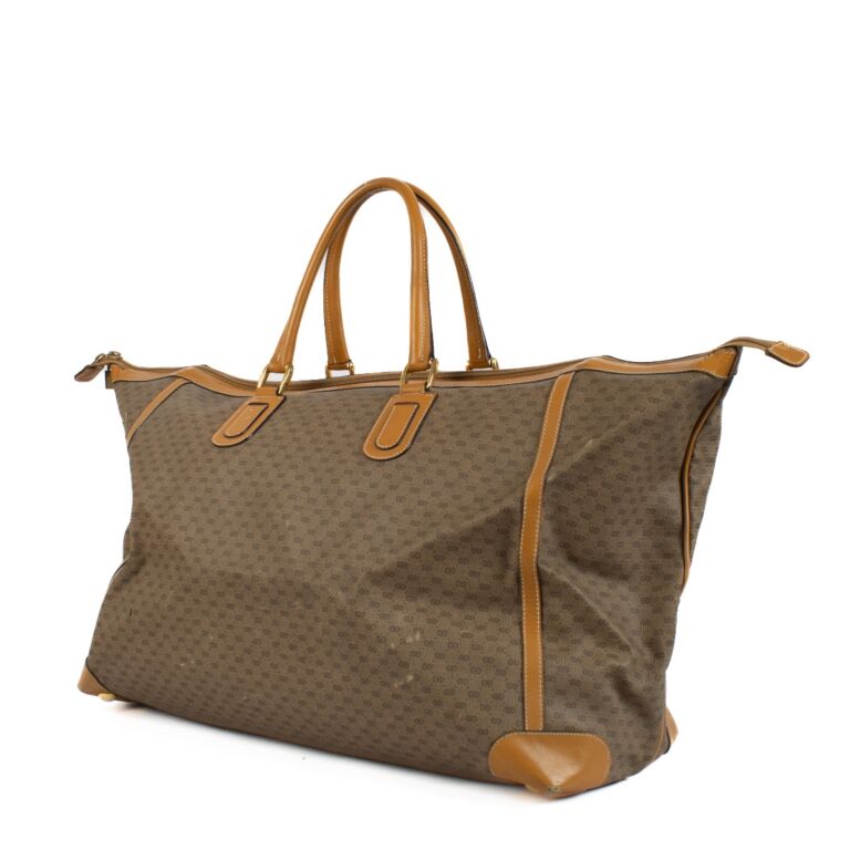 Gucci Micro GG Canvas Vintage Travel Bag Labellov Buy and Sell Authentic Luxury
