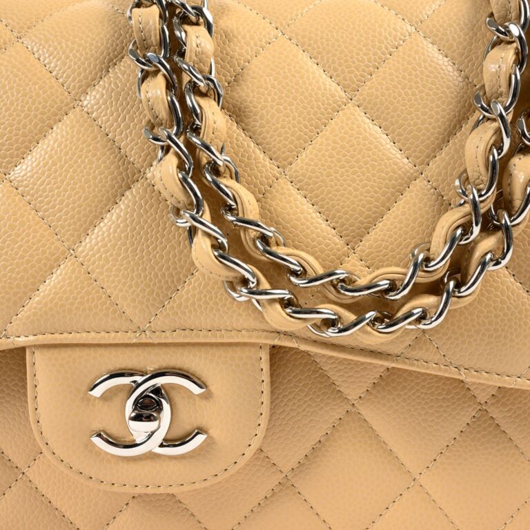 reserved* Chanel Beige Caviar Leather Classic Flap Bag Jumbo ○ Labellov ○  Buy and Sell Authentic Luxury