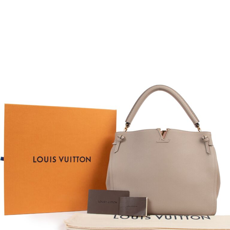 Louis Vuitton Tournon Taurillon Leather Hobo Bag Galet