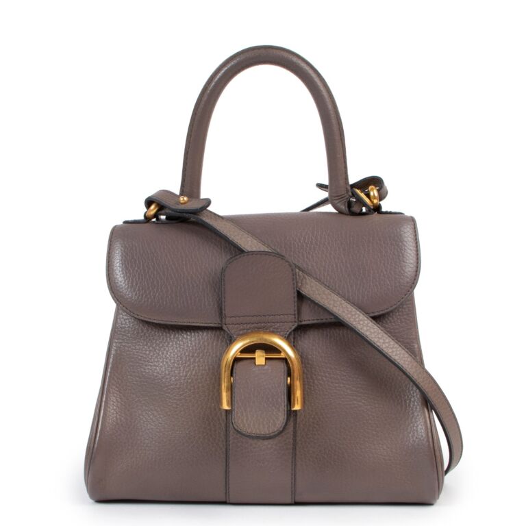 Delvaux seconde deals main