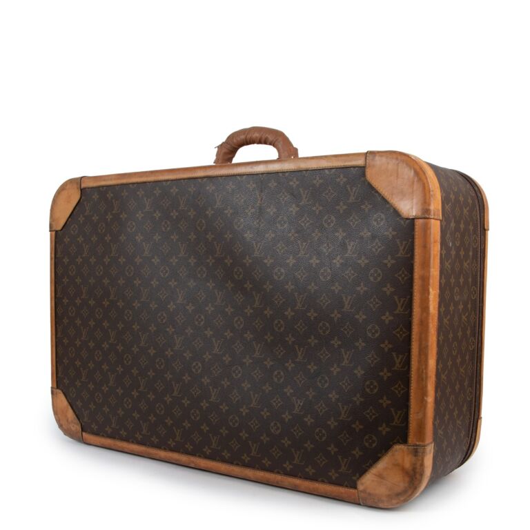 Sold at Auction: Louis Vuitton, A Louis Vuitton Stratos Monogram Travel  Suitcase c.1980