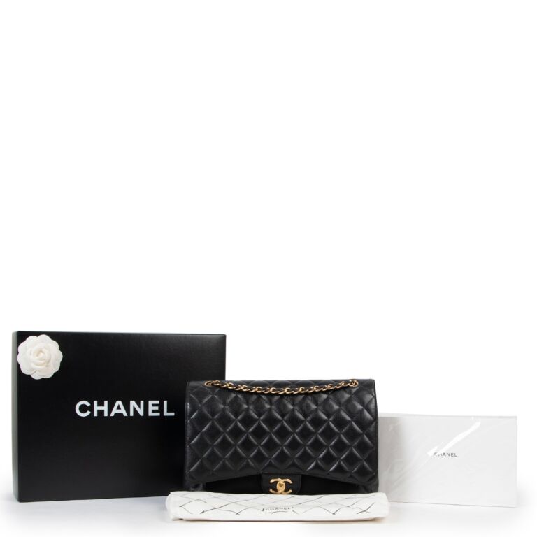 Chanel Black Caviar Maxi Classic Double Flap Bag ○ Labellov ○ Buy and Sell  Authentic Luxury