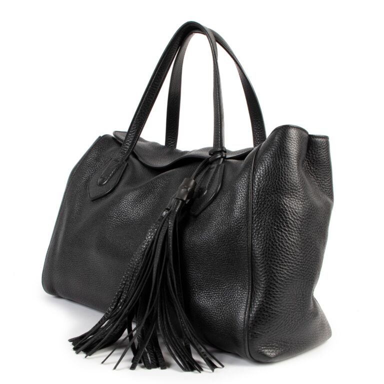 Gucci black online tassel bag