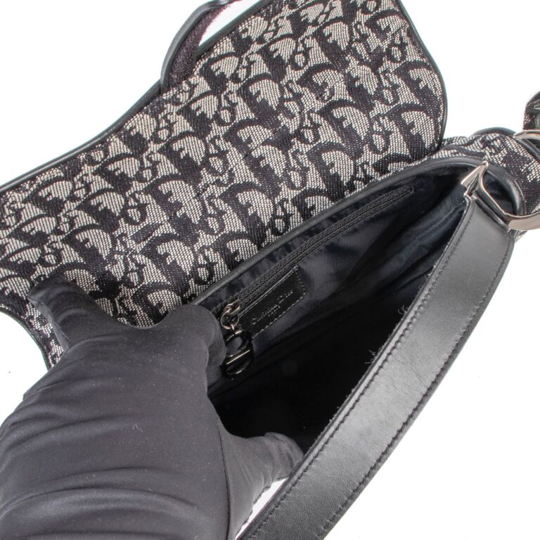 Dior oblique canvas saddle clutch best sale bag