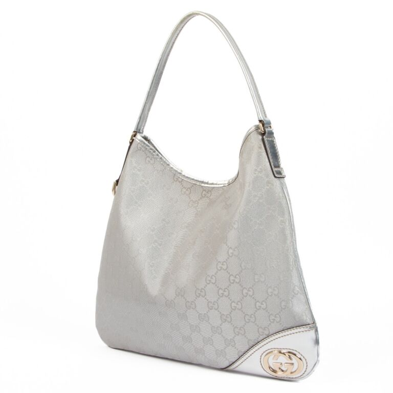Gucci silver cheap clutch