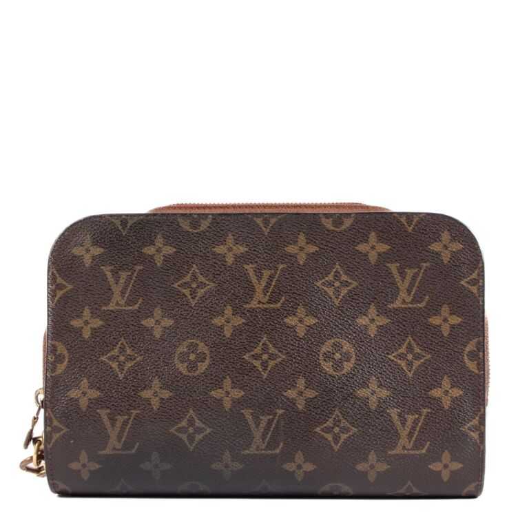 Wrist wallet louis store vuitton