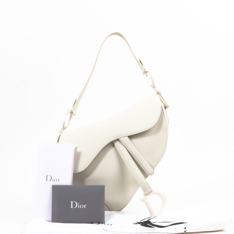 Cream dior 2025 saddle bag