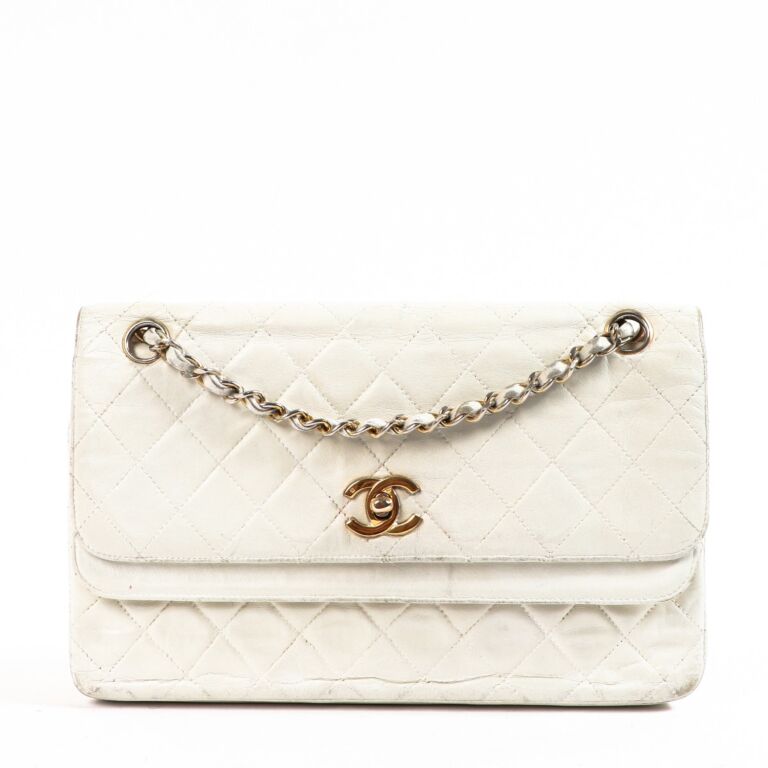 Chanel Vintage White Polyester Jumbo Classic Flap Bag  Labellov  Buy and  Sell Authentic Luxury